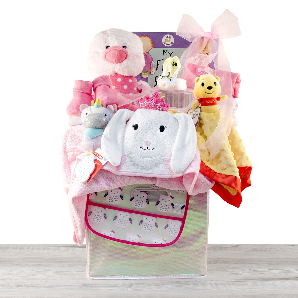 elephant, dinosaurs, animal themed baby clothes in a cardbord gift box